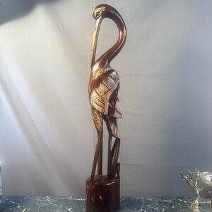 Vintage hand-carved wooden statue Of A heron